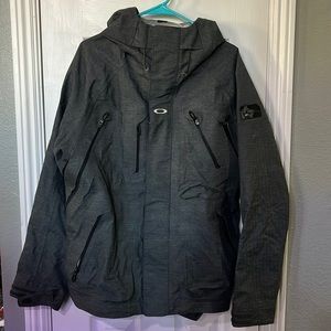 Oakley snowboarding jacket with magnetic buttons